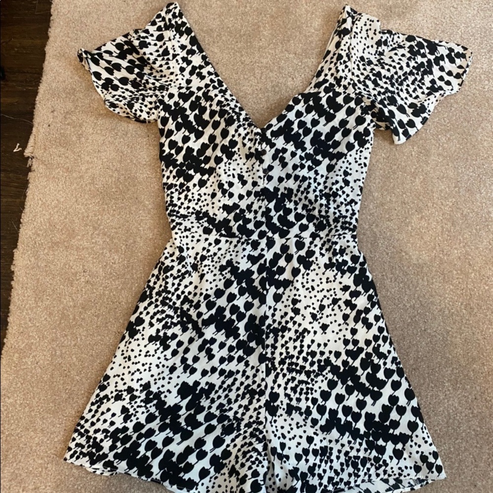 Beautiful airy black and white tie-back romper